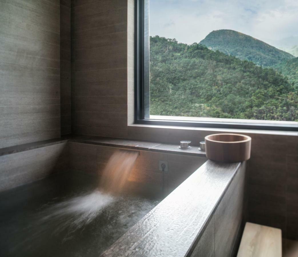 Mu Jiaoxi Hotel Exterior foto A modern onsen bath